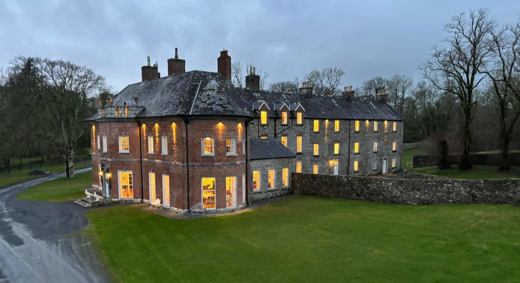 Newhall House at dusk — clan seat of Clan Ó Comáin, County Clare